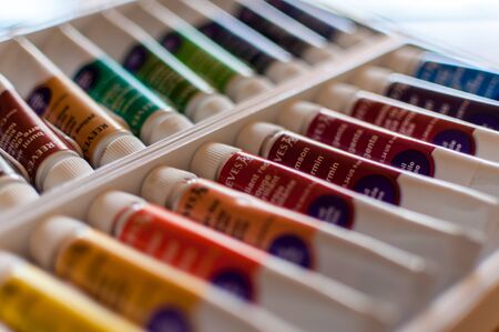 TIMISOARA, ROMANIA - JANUARY 11, 2018: Close-up of Reeves oil colors. 24 artist colours. Paint tubes.のeditorial素材