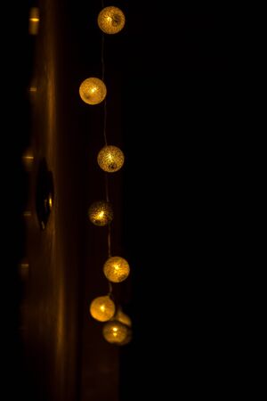 Decorative globe, light bulbs on the wall. Hanging lights. Selective focus