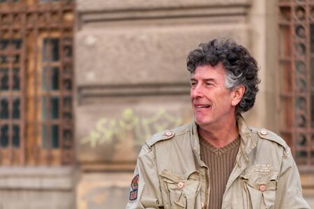 TIMISOARA, ROMANIA - FEBRUARY 09, 2016: Portrait of a man  walking on the street. Real people.のeditorial素材