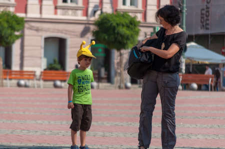 TIMISOARA, ROMANIA - SEPTEMBER 09, 2016: People walking on the street. Real people.のeditorial素材