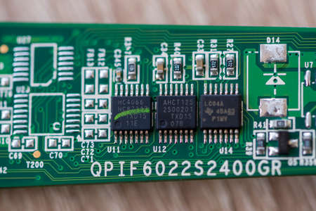TIMISOARA, ROMANIA - NOVEMBER 23, 2019: Close-up of electronic components. Nexperia HC4066, Jabbar...
