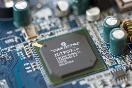 TIMISOARA, ROMANIA - MARCH 30, 2019: Close-up of a Cavium Networks Nitrox microprocessorのeditorial素材
