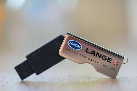 TIMISOARA, ROMANIA - JUNE 24, 2019: Close-up of a HACK LANGE pen drive, flash disk sitting on a disk...