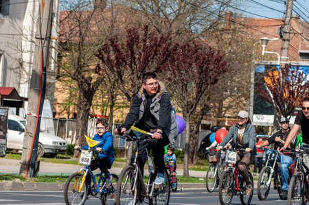 Timisoara, Romania - April 03, 2016: People riding their bicycles at the spring pedaling event