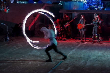 Timisoara, Romania - December 19, 2017: Abstract fire trails on a fire show. Light painting. Long...