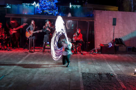 Timisoara, Romania - December 19, 2017: Abstract fire trails on a fire show. Light painting. Long exposure. Motion Blur.のeditorial素材