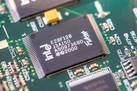 Timisoara, Romania - April 30, 2020: Close-up of an Intel E28F128 J3A150 StrataFlash Memory....
