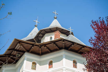 A view of the Crisan Vaca monastery against the clear blue skyの写真素材