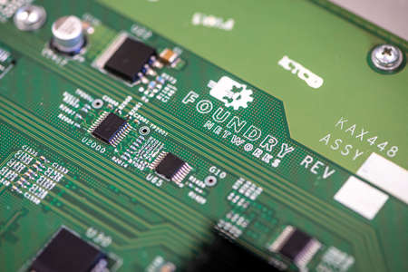 Timisoara, Romania - April 09, 2020: Close-up of the Foundry Networks logo printed on a circuit...