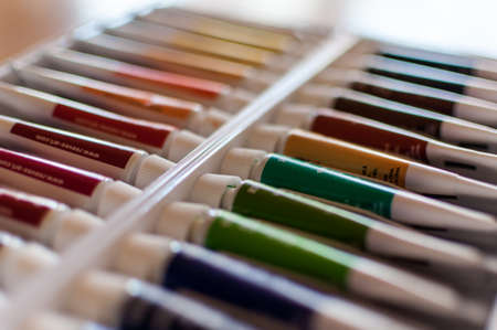 TIMISOARA, ROMANIA - JANUARY 11, 2018: Close-up of Reeves oil colors. 24 artist colours. Paint tubes.のeditorial素材