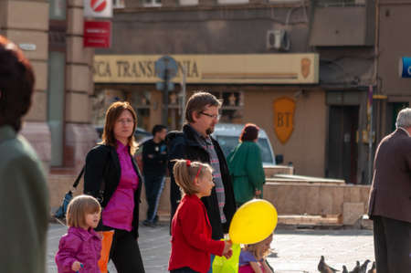 Timisoara, Romania - June 02, 2013: People walking on the street. Real people.のeditorial素材