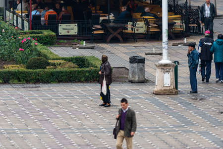Timisoara, Romania - October 13, 2012: People walking on the street. Real people.のeditorial素材