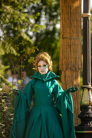 Timisoara, Romania - September 05, 2020: Portrait of a woman in a dress posing as a human statueのeditorial素材