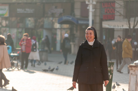 Timisoara, Romania - February 16, 2017: People walking on the street. Real people.のeditorial素材