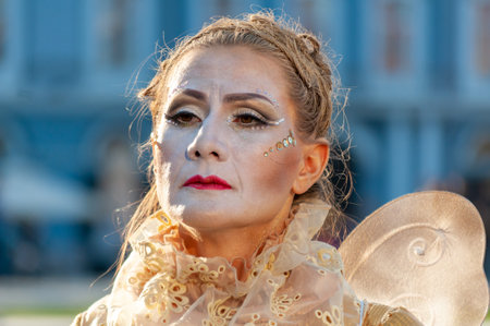 Timisoara, Romania - March 31, 2017: Woman in a masquerade costume dress posing as a living statue at the CheckArt carnavalのeditorial素材