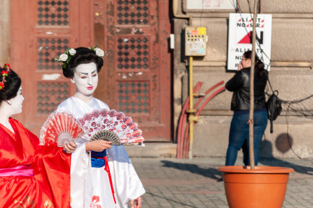 Timisoara, Romania - March 31, 2017: Geisha, woman in traditional japanese kimono at the CheckArt Carnavalのeditorial素材