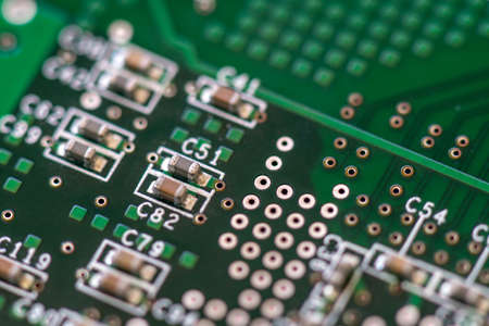 Close-up of a SMD capacitors on a printed circuit board. Electronic components.の写真素材