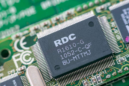 Timisoara, Romania - March 15, 2020: Close-up of a RDC R1610-G microcontroller. Electronic componentsのeditorial素材