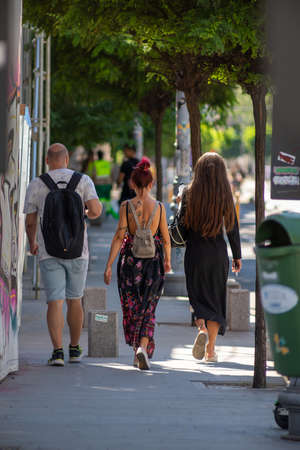 Bucharest, Romania - August 07, 2021: People walking on the street. Real people.