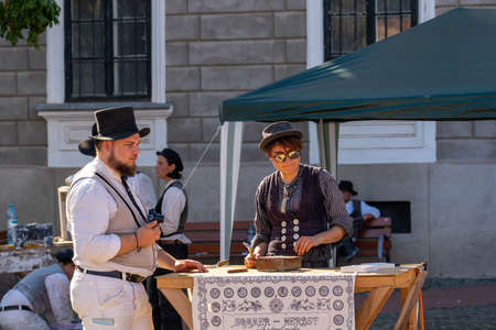 Timisoara, Romania - September 26, 2021: Travelling journeymen wearing old traditional clothes at the Hungarian Cultural Daysのeditorial素材
