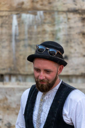 Timisoara, Romania - September 25, 2021: Portrait of travelling journeymen wearing old traditional clothes at the Hungarian Cultural Daysのeditorial素材