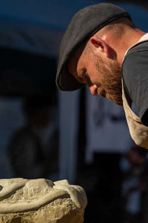 Timisoara, Romania - September 26, 2021: Portrait of travelling journeymen wearing old traditional clothes at the Hungarian Cultural Daysのeditorial素材