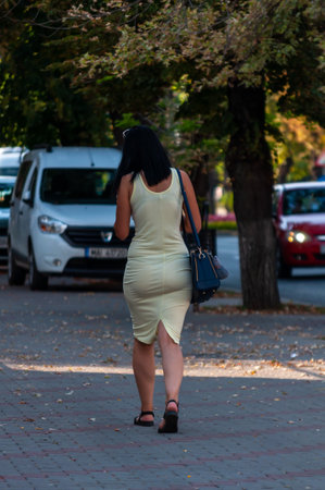 Bistrita, Romania - September 01, 2018: Woman walking on the street. Real people.のeditorial素材