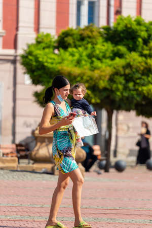 Timisoara, Romania - September 15, 2021: Woman walking on the street. Real people.のeditorial素材