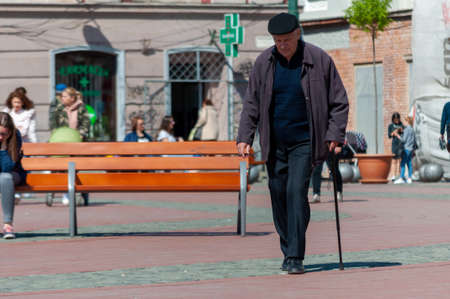 Timisoara, Romania - April 25, 2017: Man walking on the street. Real people.のeditorial素材