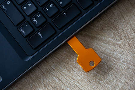 Close-up of a flash drive connected on a laptop
