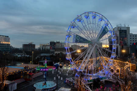 Timisoara, Romania - December 17, 2021: A view of a ferris wheel. Night sceneのeditorial素材