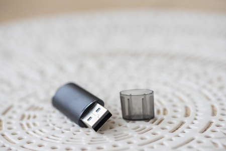 Close-up of a flash drive sitting on a table