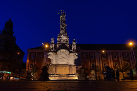 A view of the Saint Mary statue in the night. Unrecognizable people.の写真素材