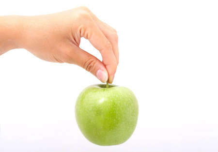 Apple in a handの写真素材