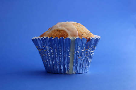 A muffin on blue backgroundの写真素材