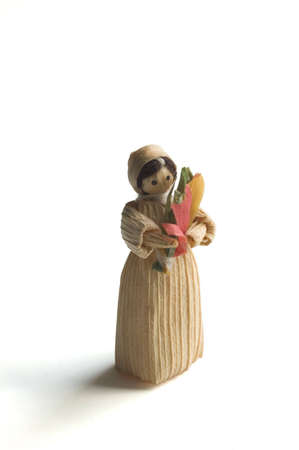 A small paper ornament of a peasant woman.の写真素材