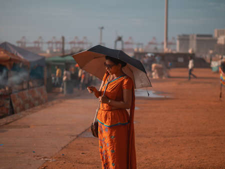 Colombo, Sri Lanka - September 21st, 2018 : Umbrellas good shields from sun as well as rain