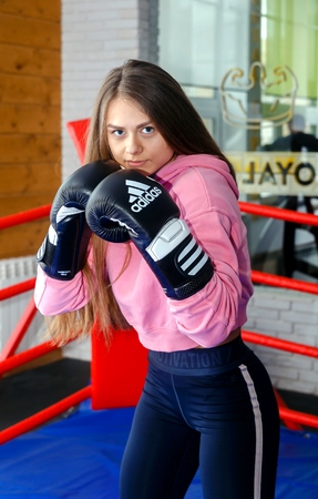 GRODNO, BELARUS - OCTOBER 24, 2017.Beautiful girl is engaged in a gymのeditorial素材