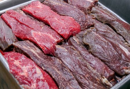 cutting beef at a meat factory.の写真素材