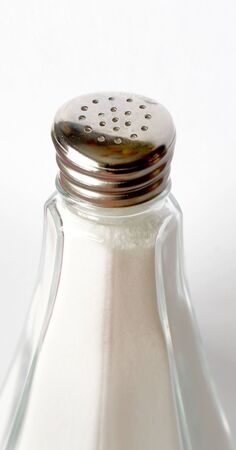 Salt shaker in uniquely shaped container (abstract)の写真素材