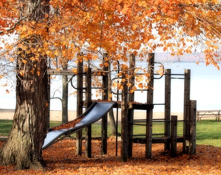 Playground at outdoor park - lake in the backgroundの写真素材