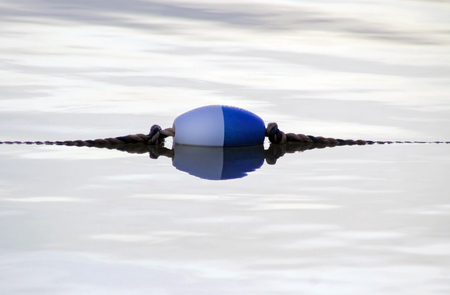 Buoy used as a boundary marker on public beachの写真素材