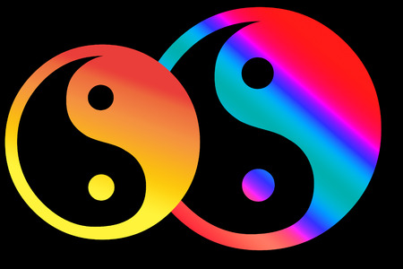 Two yin yang symbols on a black backgroundの写真素材