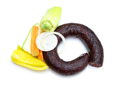 black pudding with vegetables on white backgroundの写真素材