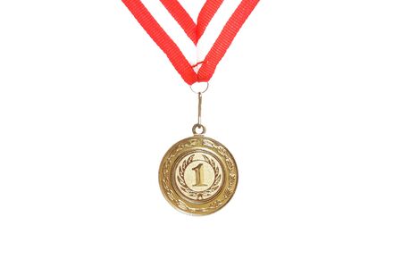 golden medal for first place with red and white ribbonの写真素材