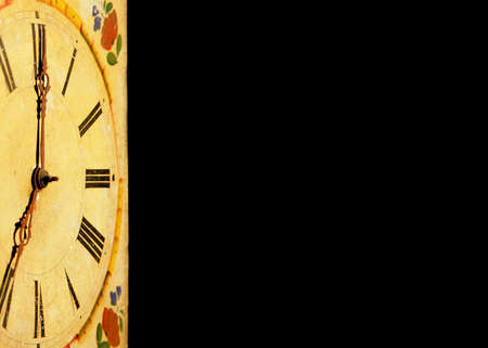 clock face isolated on black background with hours and minutes indicatorsの写真素材