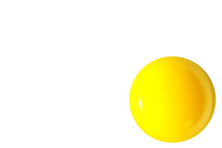 raw shining yello egg yolk isolated on white background