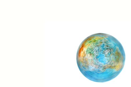 world colored globe turning isolated on white backgroundの写真素材