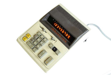 very old vintage calculator with lamp display isolated on white backgroundの写真素材