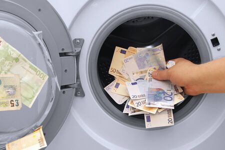 hand money laundering problem illegal cash euros and poundsの写真素材